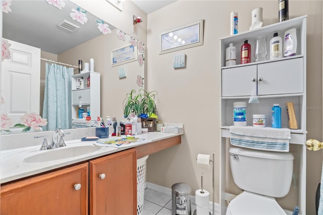 14 Sequoia Way, Kissimmee, FL 34758 - full bathroom featuring toilet, tile patterned flooring, baseboards, and vanity