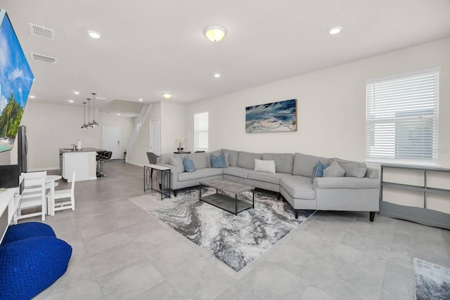 living room with recessed lighting