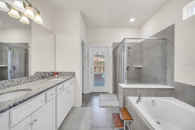 full bathroom with a stall shower, tile patterned flooring, plenty of natural light, and a garden tub
