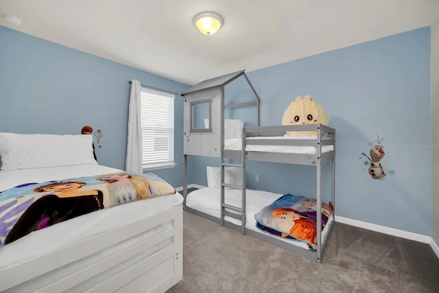 carpeted bedroom with baseboards