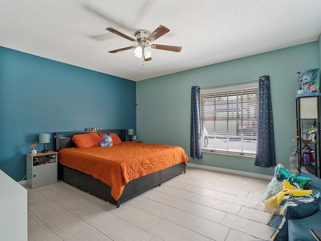 1064 Universal Rest Pl, Kissimmee, FL 34744 - bedroom featuring a textured ceiling and a ceiling fan