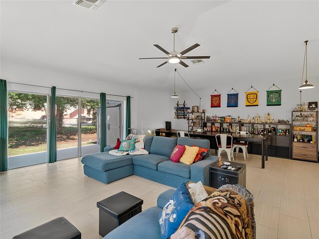 1064 Universal Rest Pl, Kissimmee, FL 34744 - living room featuring a ceiling fan