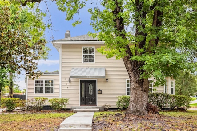 490 Shoreview Ave, Winter Park, FL 32789 - traditional-style home with a chimney