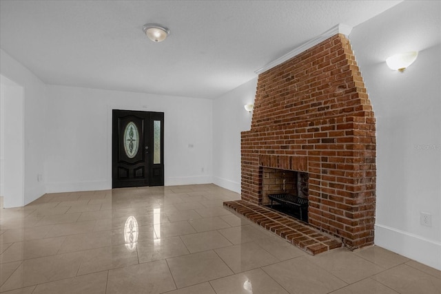 490 Shoreview Ave, Winter Park, FL 32789 - tiled entryway featuring a brick fireplace and baseboards