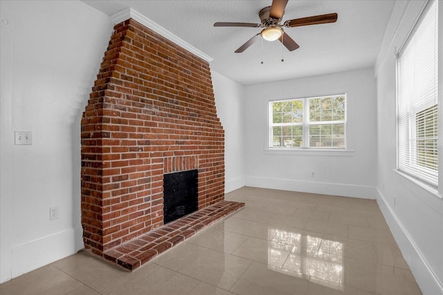 490 Shoreview Ave, Winter Park, FL 32789 - unfurnished living room featuring a fireplace, tile patterned flooring, ceiling fan, and baseboards