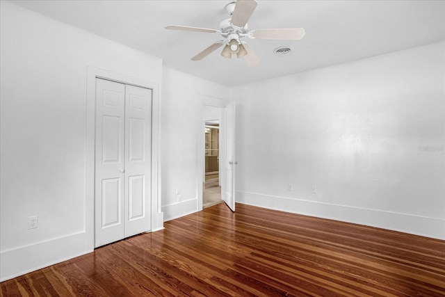490 Shoreview Ave, Winter Park, FL 32789 - unfurnished bedroom featuring a closet, wood finished floors, a ceiling fan, and baseboards