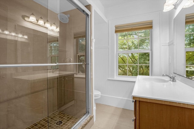 490 Shoreview Ave, Winter Park, FL 32789 - bathroom with tile patterned flooring, vanity, a stall shower, and toilet