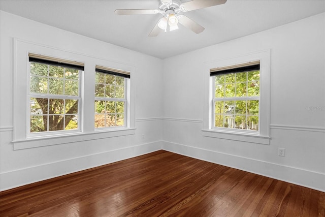 490 Shoreview Ave, Winter Park, FL 32789 - empty room featuring dark wood-style flooring, baseboards, and ceiling fan