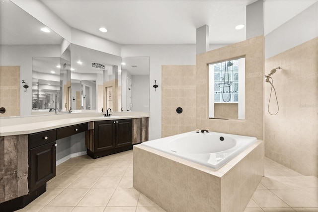 1601 Stargazer Ter, Sanford, FL 32771 - bathroom with tile patterned flooring, a bath, vanity, walk in shower, and recessed lighting