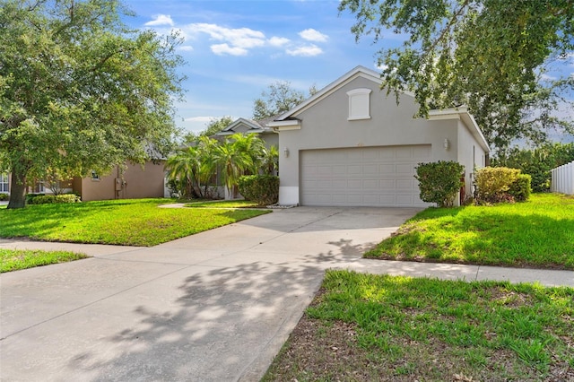 4520 Barrister Dr, Clermont, FL 34711 - view of front of home featuring stucco siding, concrete driveway, a front yard, and an attached garage