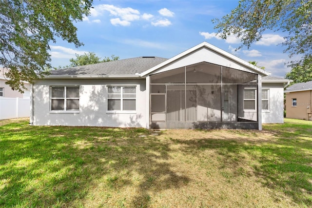 4520 Barrister Dr, Clermont, FL 34711 - back of house with a sunroom, stucco siding, and a ceiling fan