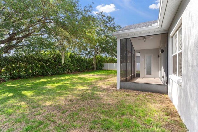 4520 Barrister Dr, Clermont, FL 34711 - view of yard featuring a sunroom