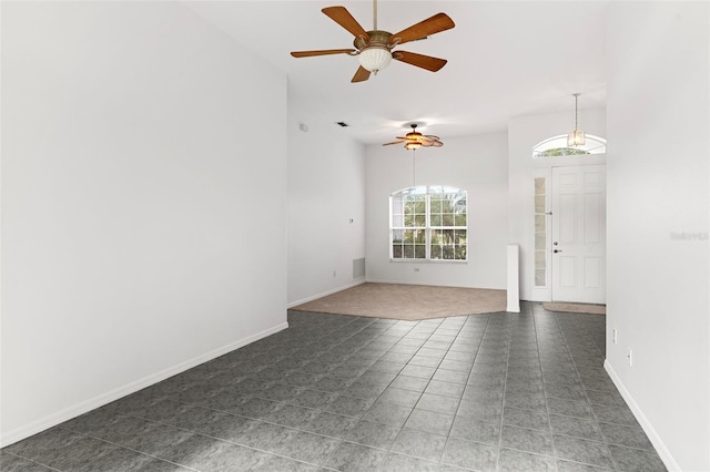 4520 Barrister Dr, Clermont, FL 34711 - tiled empty room with ceiling fan and baseboards