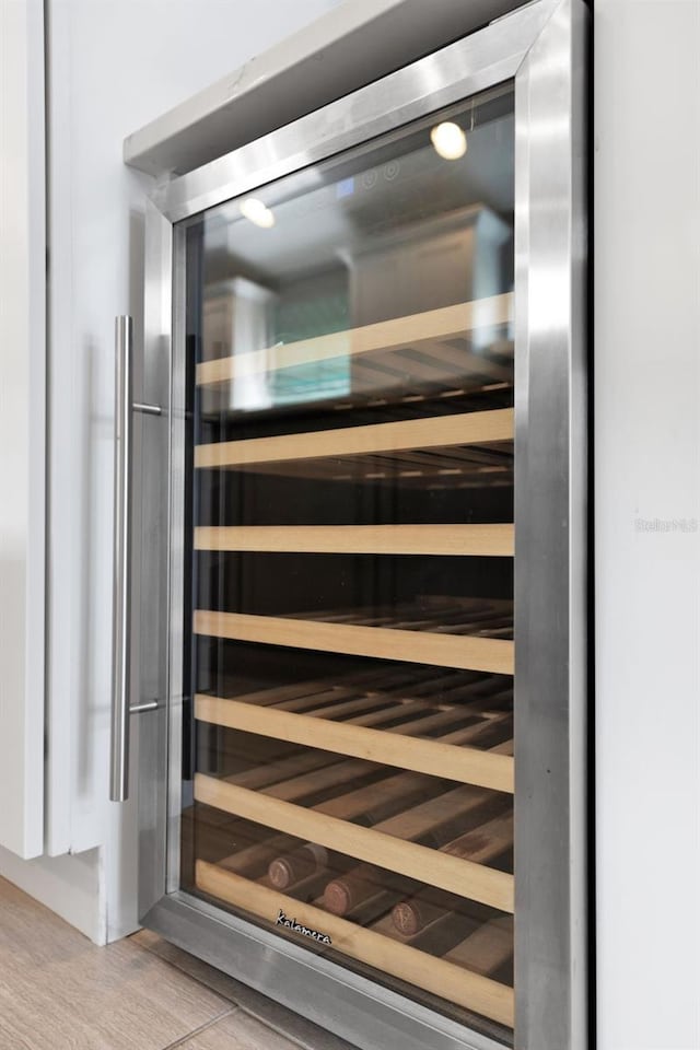 2776 Joseph Cir, Oviedo, FL 32765 - detailed view of wine cooler and wood finished floors
