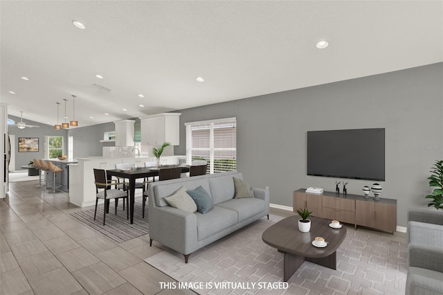 2776 Joseph Cir, Oviedo, FL 32765 - living room with recessed lighting and baseboards