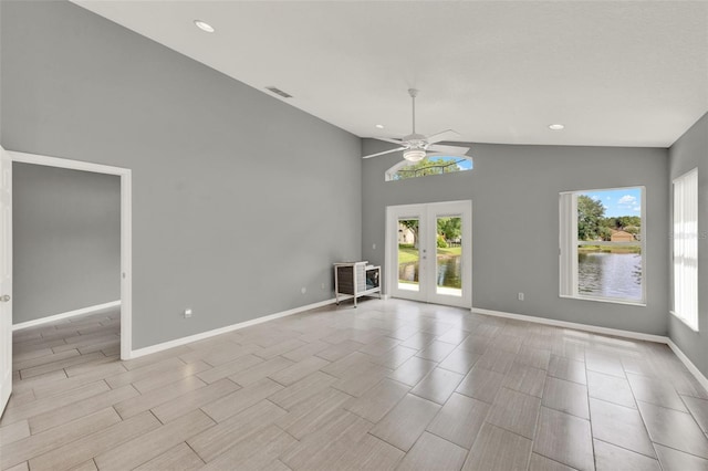 2776 Joseph Cir, Oviedo, FL 32765 - spare room with vaulted ceiling, ceiling fan, baseboards, french doors, and recessed lighting