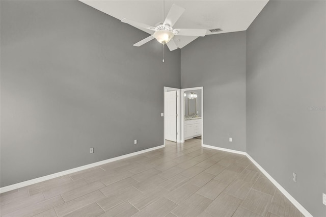 2776 Joseph Cir, Oviedo, FL 32765 - empty room with ceiling fan, high vaulted ceiling, and baseboards
