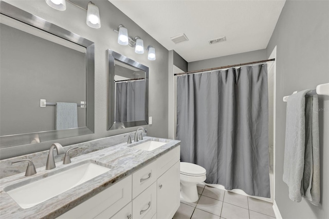 2776 Joseph Cir, Oviedo, FL 32765 - full bath featuring toilet, double vanity, and tile patterned flooring