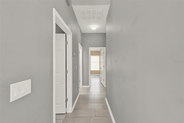 2776 Joseph Cir, Oviedo, FL 32765 - corridor featuring baseboards and light tile patterned flooring