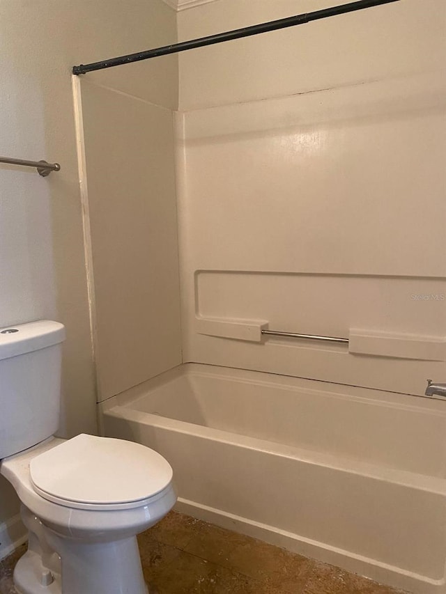 2007 Dixie Belle Dr Unit 2007M, Orlando, FL 32812 - bathroom with toilet, shower / bathtub combination, and tile patterned flooring