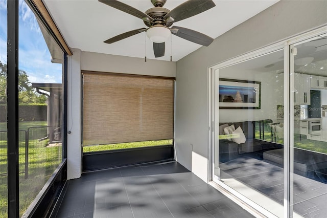 2520 Oakington St, Winter Garden, FL 34787 - unfurnished sunroom with a ceiling fan and healthy amount of natural light