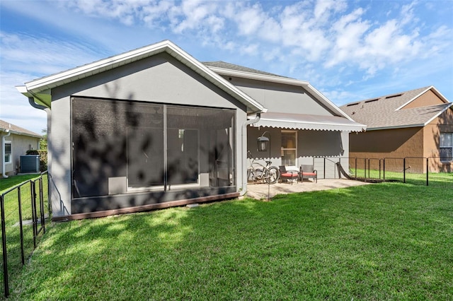 2520 Oakington St, Winter Garden, FL 34787 - back of house with central air condition unit, a sunroom, stucco siding, and a patio