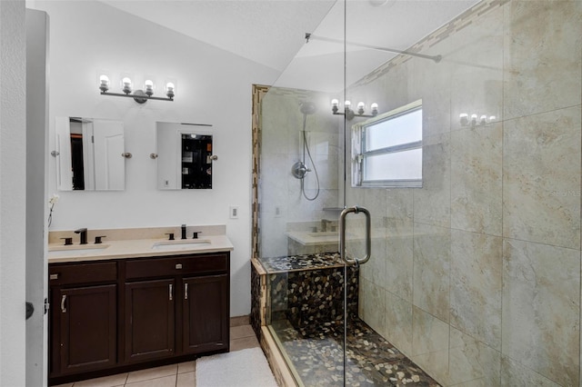 2520 Oakington St, Winter Garden, FL 34787 - full bath with a stall shower, double vanity, lofted ceiling, tile patterned floors, and a chandelier