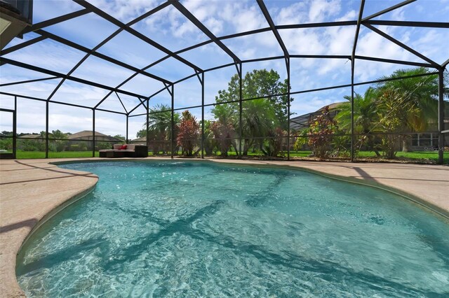 2801 Boat Cove Cir, Kissimmee, FL 34746 - swimming pool featuring a lanai and a patio