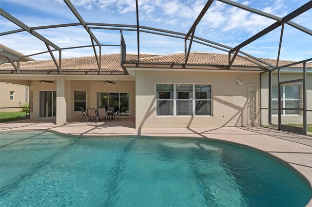 2801 Boat Cove Cir, Kissimmee, FL 34746 - rear view of property with a tiled roof, a patio area, ceiling fan, and stucco siding