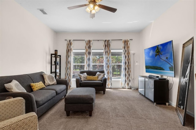 2801 Boat Cove Cir, Kissimmee, FL 34746 - carpeted living room with a ceiling fan