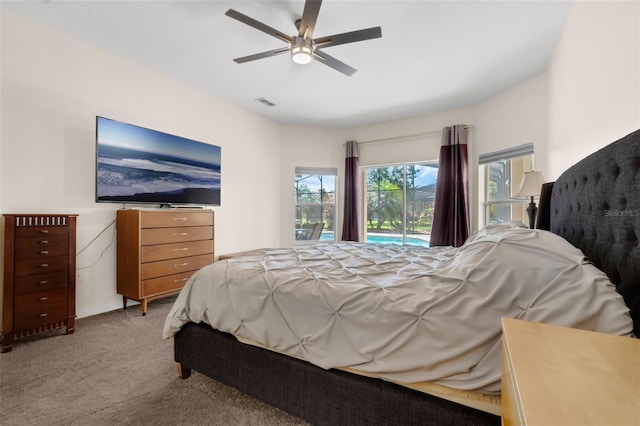 2801 Boat Cove Cir, Kissimmee, FL 34746 - bedroom featuring access to exterior, carpet floors, and ceiling fan