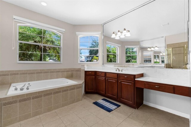 2801 Boat Cove Cir, Kissimmee, FL 34746 - full bathroom with tile patterned flooring, plenty of natural light, and a bath
