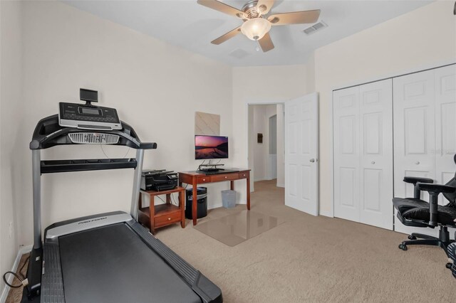 2801 Boat Cove Cir, Kissimmee, FL 34746 - exercise room with carpet and a ceiling fan