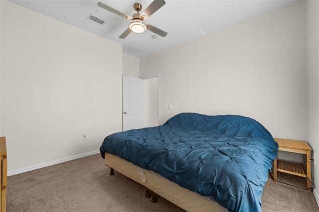 2801 Boat Cove Cir, Kissimmee, FL 34746 - bedroom featuring carpet, baseboards, and a ceiling fan