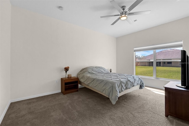 2801 Boat Cove Cir, Kissimmee, FL 34746 - bedroom featuring carpet floors, baseboards, and ceiling fan