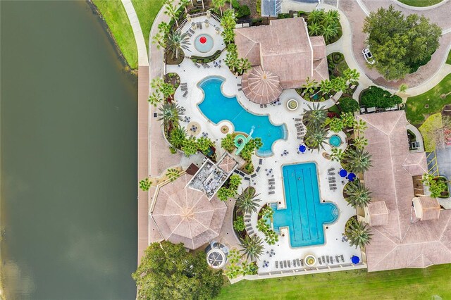 2801 Boat Cove Cir, Kissimmee, FL 34746 - bird's eye view of a pool area and a large body of water