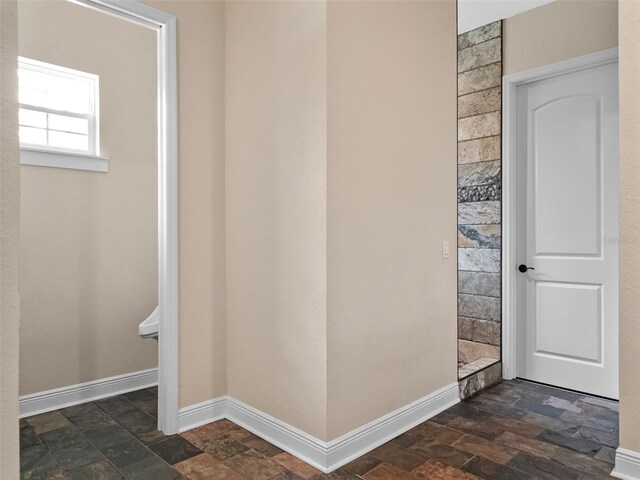 20199 Sweetwood Ln, Clermont, FL 34715 - interior space with stone tile flooring and baseboards