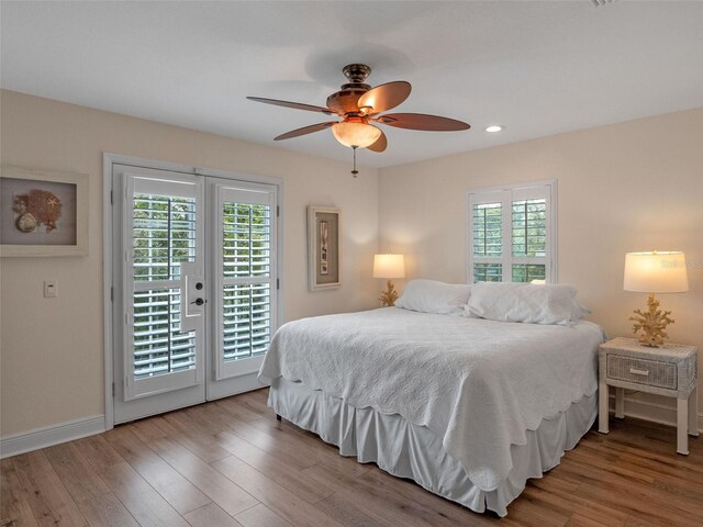 20199 Sweetwood Ln, Clermont, FL 34715 - bedroom featuring access to exterior, wood finished floors, baseboards, recessed lighting, and ceiling fan