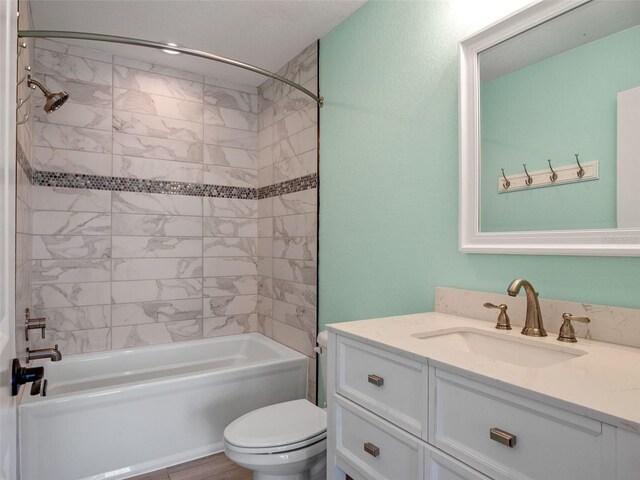 20199 Sweetwood Ln, Clermont, FL 34715 - bathroom featuring toilet, vanity, and  shower combination