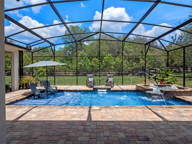 20199 Sweetwood Ln, Clermont, FL 34715 - view of swimming pool featuring a patio area, a lanai, and a pool with connected hot tub