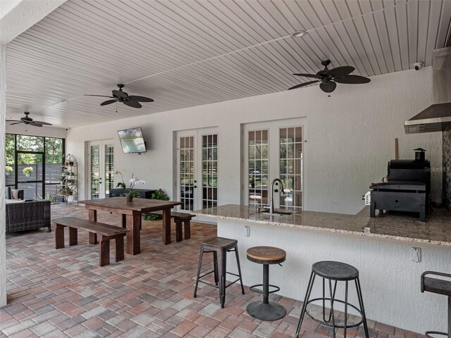 20199 Sweetwood Ln, Clermont, FL 34715 - view of patio with french doors, ceiling fan, and grilling area
