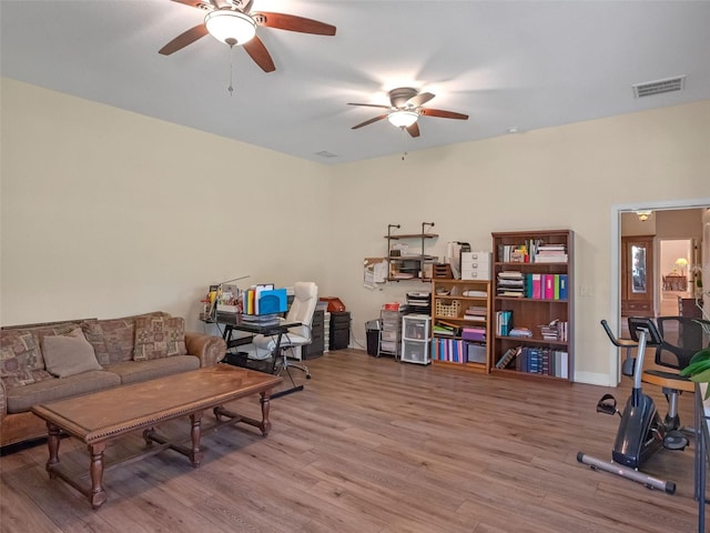 20199 Sweetwood Ln, Clermont, FL 34715 - living room with ceiling fan and wood finished floors