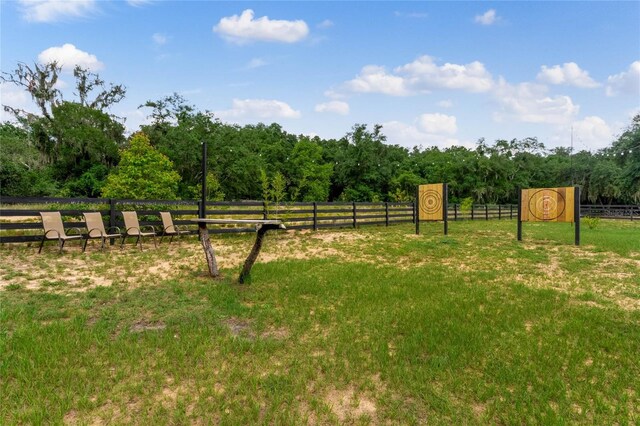 20199 Sweetwood Ln, Clermont, FL 34715 - view of yard featuring a view of trees