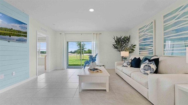 3665 Marlberry Way, Sanford, FL 32773 - living room with light tile patterned floors, baseboards, and recessed lighting