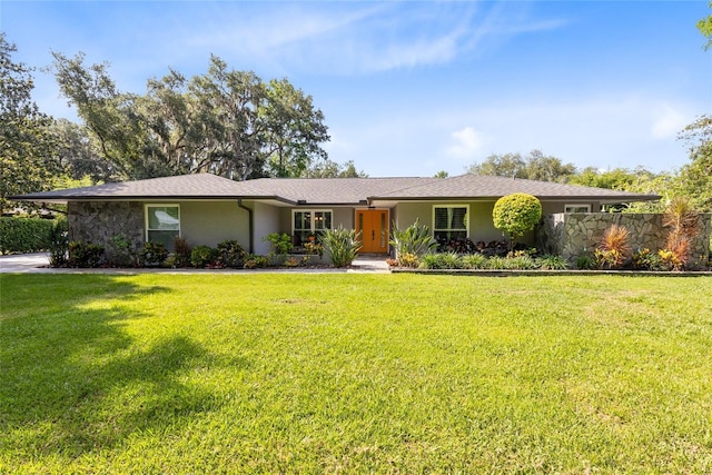 5370 Whispering Pine Cir, Saint Cloud, FL 34771 - ranch-style home with stucco siding