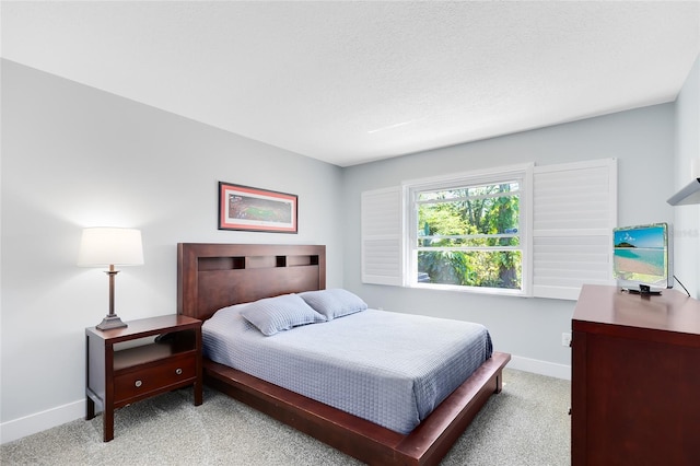 5370 Whispering Pine Cir, Saint Cloud, FL 34771 - bedroom with light colored carpet and baseboards