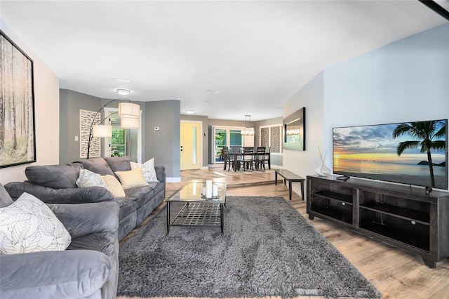 5370 Whispering Pine Cir, Saint Cloud, FL 34771 - living room with light wood-type flooring and baseboards