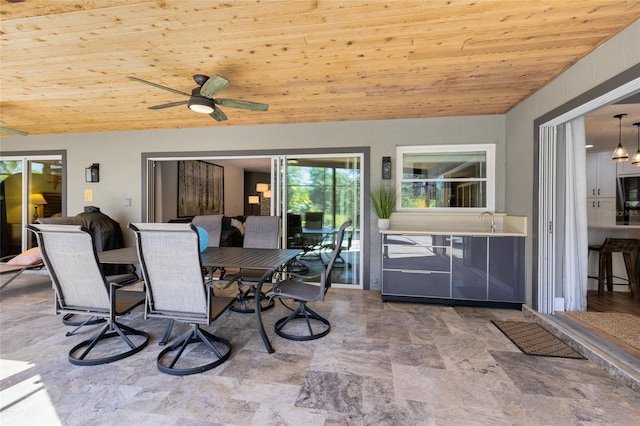 5370 Whispering Pine Cir, Saint Cloud, FL 34771 - view of patio / terrace featuring a ceiling fan, outdoor dining space, and a sink
