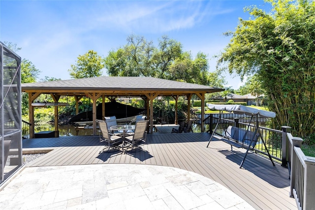 5370 Whispering Pine Cir, Saint Cloud, FL 34771 - wooden terrace with outdoor dining space