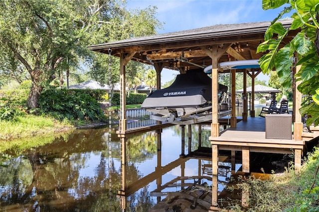 5370 Whispering Pine Cir, Saint Cloud, FL 34771 - dock area with boat lift and a water view